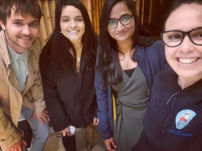 a group of people posing for a photo