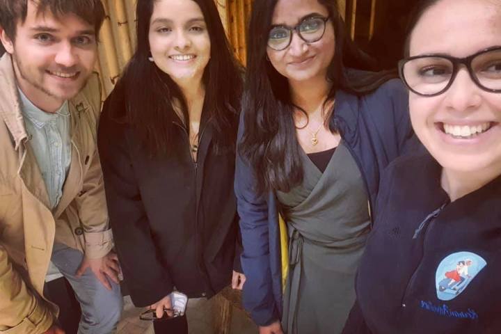 a group of people posing for a photo