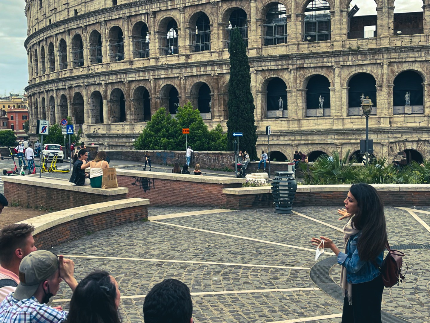 a group of people standing in front of a building