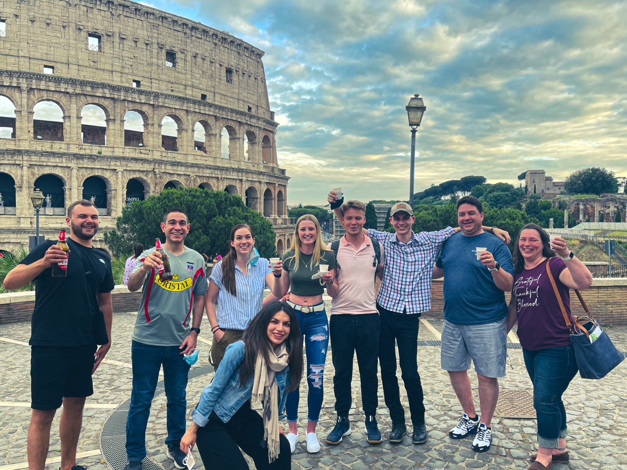 a group of people standing in front of a building