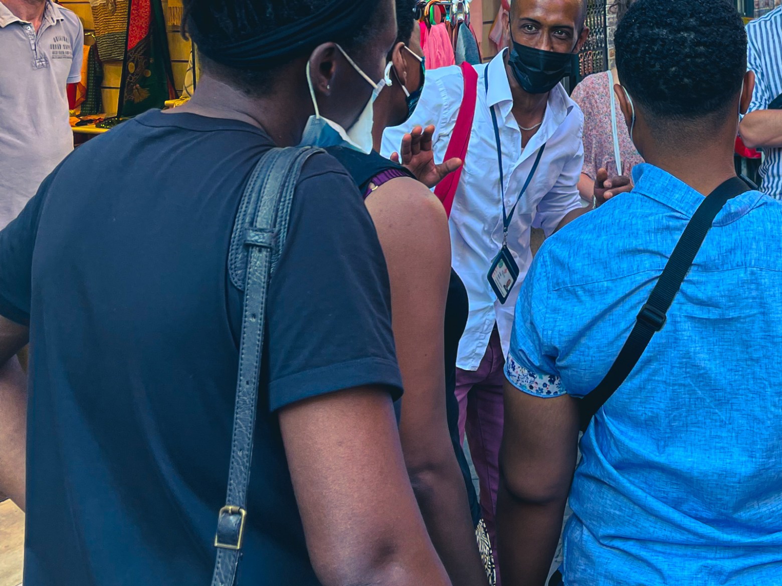 a group of people standing in front of a crowd