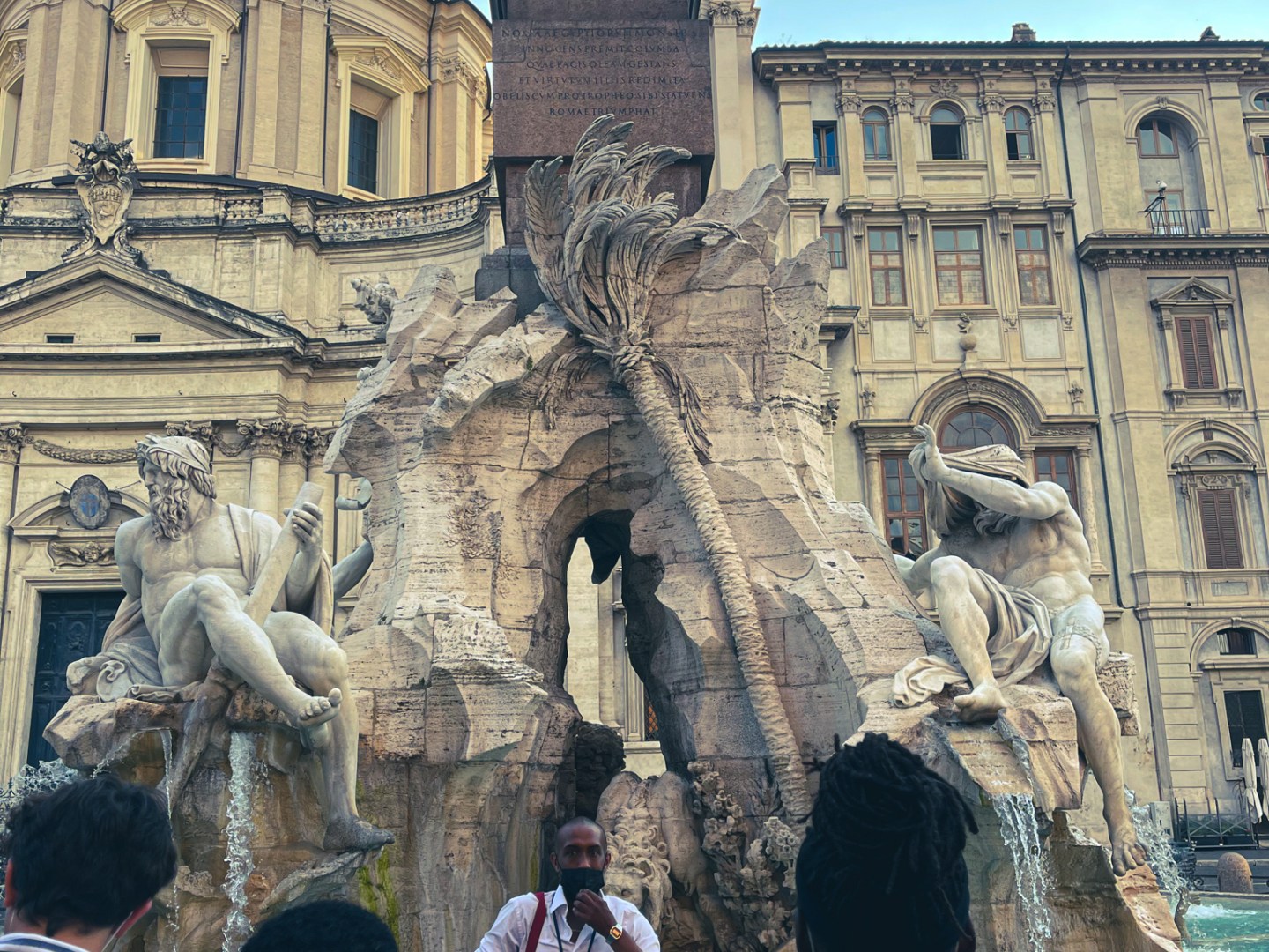 a group of people standing in front of a building