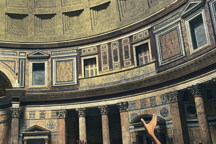 a group of people standing in front of a building